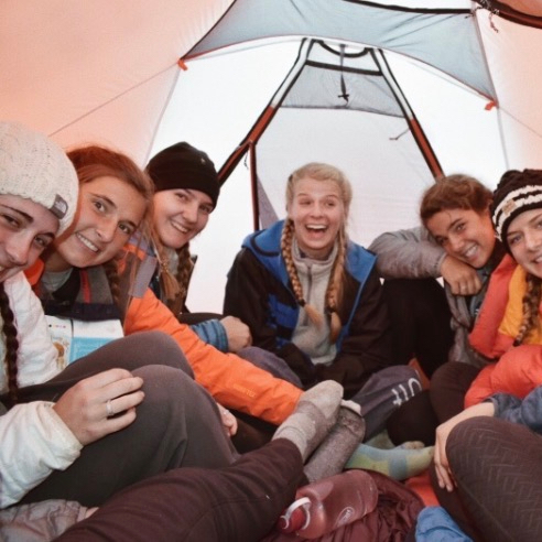 Girls in a tent hiking Kilimanjaro
